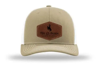 Hufeisen Ranch Throwback Leather Patch HatThank you for supporting our Ranch!! 

Introducing the Richardson 112 Trucker Snapback - The Ultimate Blend of Style and Comfort
Elevate your hat game with the RichaHufeisen Ranch Throwback Leather Patch HatThe Hufeisen-Ranch (WYO Wagyu)